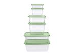 A stack of clear rectangular food storage containers with light green lids, varying in size.