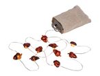 Acorn-shaped LED string lights with a battery pack in a burlap pouch.