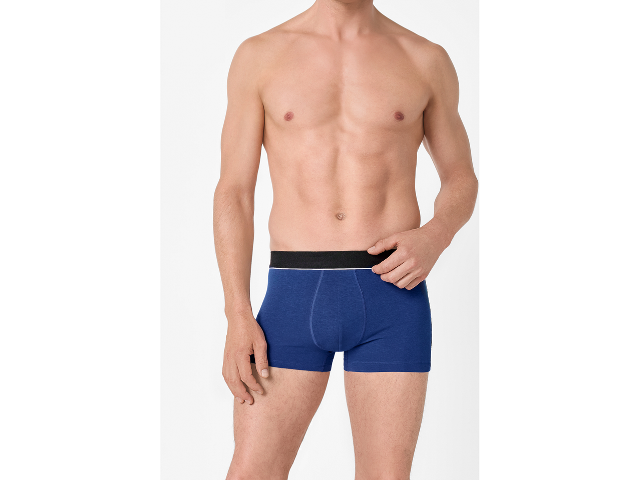 esmara® Men's Boxers: A man wearing blue boxers, showing his torso.
