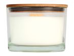 White candle in a clear glass jar with a wooden lid
