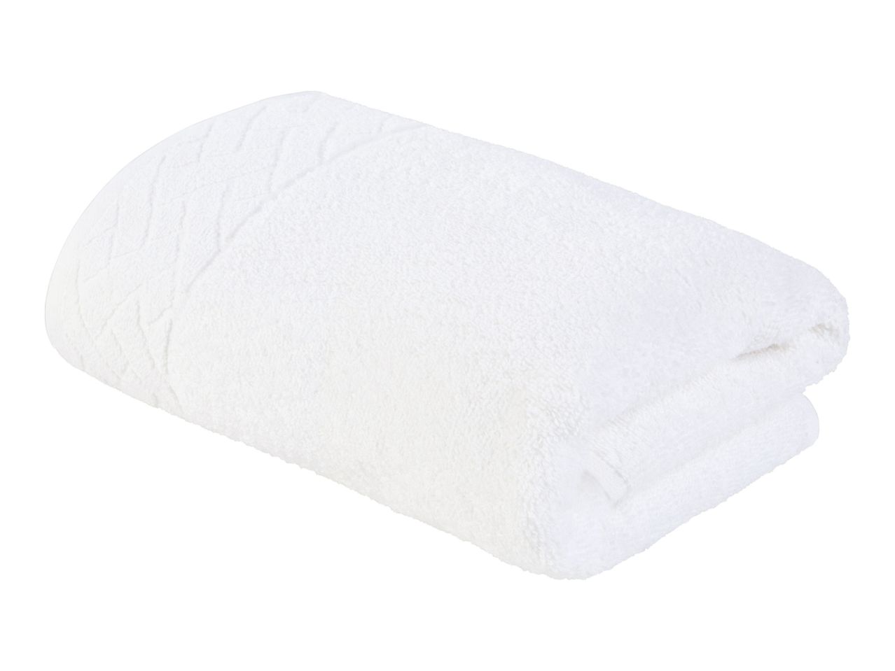A folded white bath towel.