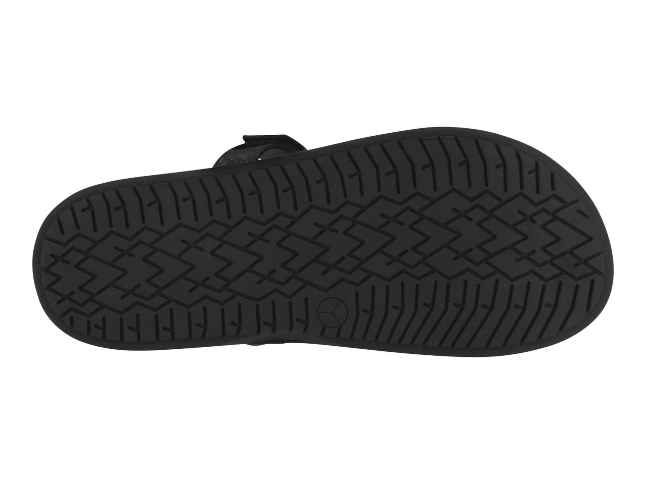 Bottom view of a black sandal with a textured sole pattern and a small circular logo.