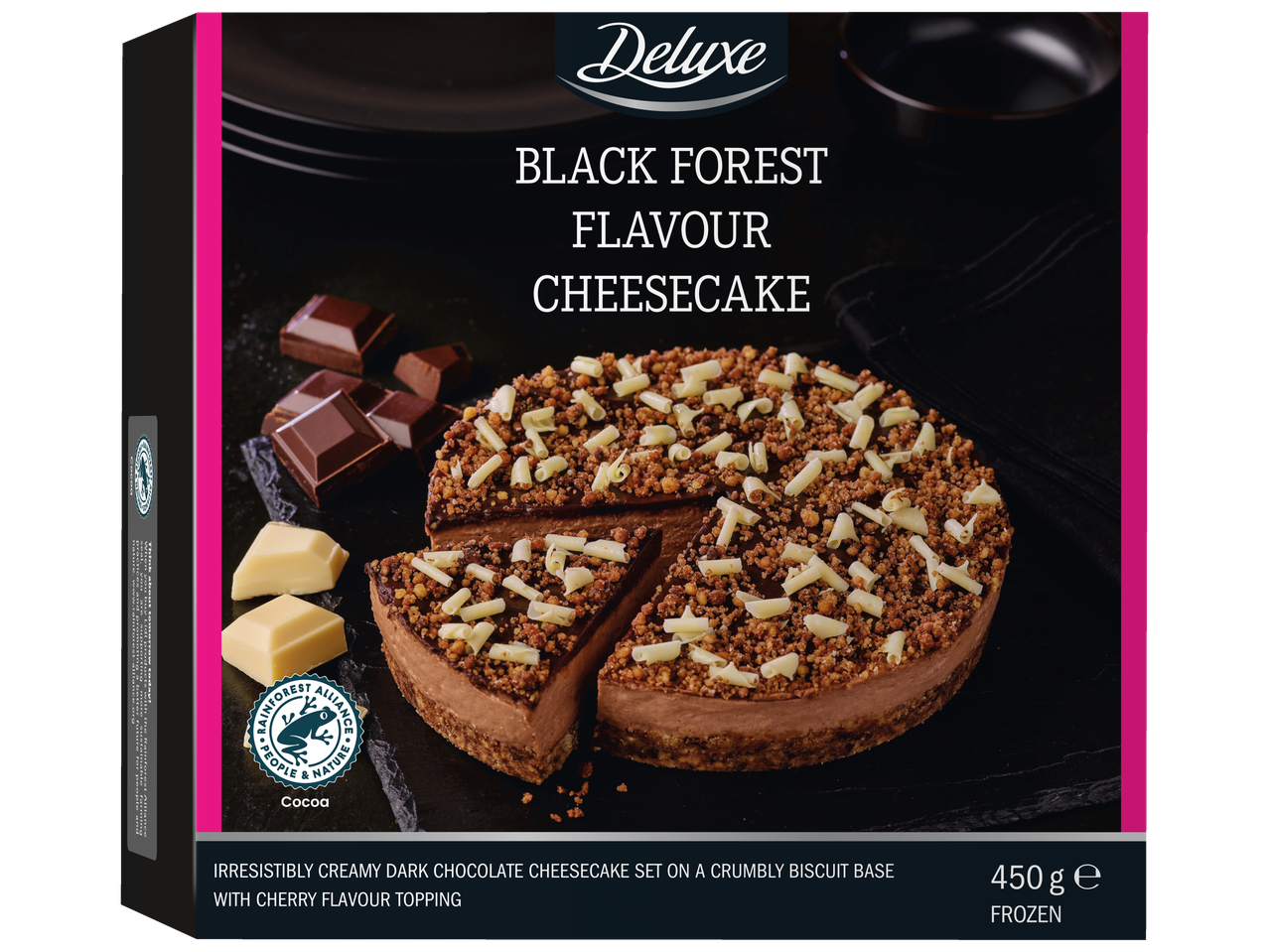 Deluxe Black Forest Flavour Cheesecake with dark chocolate, white chocolate curls, and a Rainforest Alliance seal.