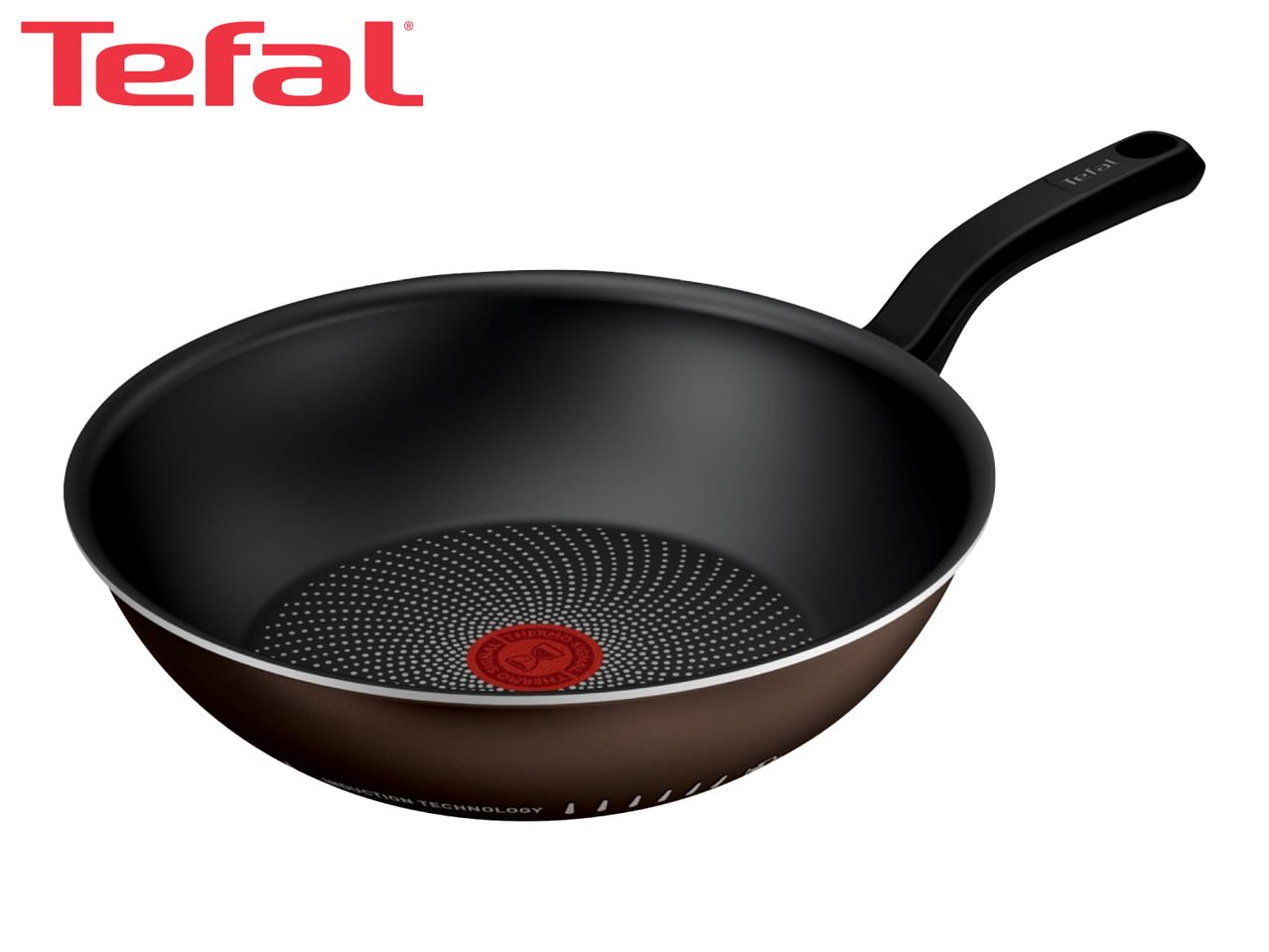 A dark brown wok with a black handle and a red heat indicator in the center of the cooking surface.