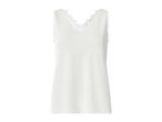 White women's tank top with lace trim on the V-neckline.