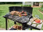 Summer BBQ: meat, vegetable skewers, and grilled vegetables.