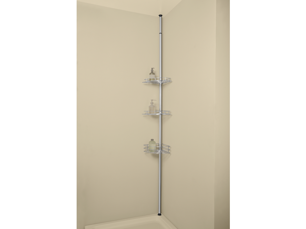 LIVARNO home Extendable Bathroom Caddy with three shelves and bottles in a corner.