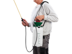 Man holding a Parkside® garden sprayer with a long nozzle.