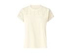 Women's cream-colored short-sleeved top with embroidered details on the shoulders.