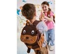 Two children with adorable animal-themed backpacks, possibly from a brand like Skip Hop.