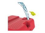 Water being poured into a red water container with a green cap floating nearby.