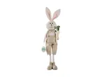 Easter bunny decoration in overalls holding a carrot and a 'Happy Easter' egg.