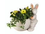 Rabbit-shaped planter with chrysanthemums and kalanchoe.