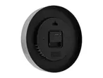 Back of a round wall clock with a brushed metal frame, showing the battery compartment and settings.