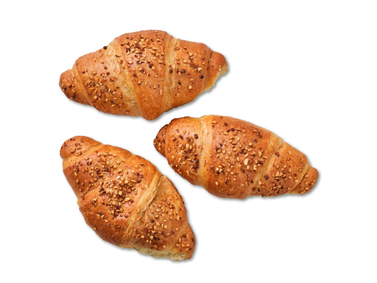 Trīs sezama sēklu kruasāni.