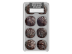 Eight chocolate truffles with sprinkles in a plastic tray.