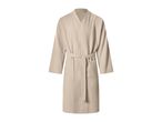 Beige waffle weave bathrobe with a tie belt and pockets.