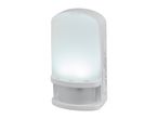 White motion sensor night light with a frosted diffuser, illuminated brightly.