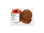 Verpakte rundvlees- en varkenshamburgers.