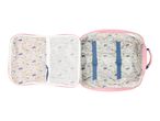 Open pink suitcase with a playful forest pattern lining and blue elastic straps.