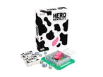 A board game called 'Herd Mentality' with cow-print packaging, cards, tokens, a pink pig, and a pen.