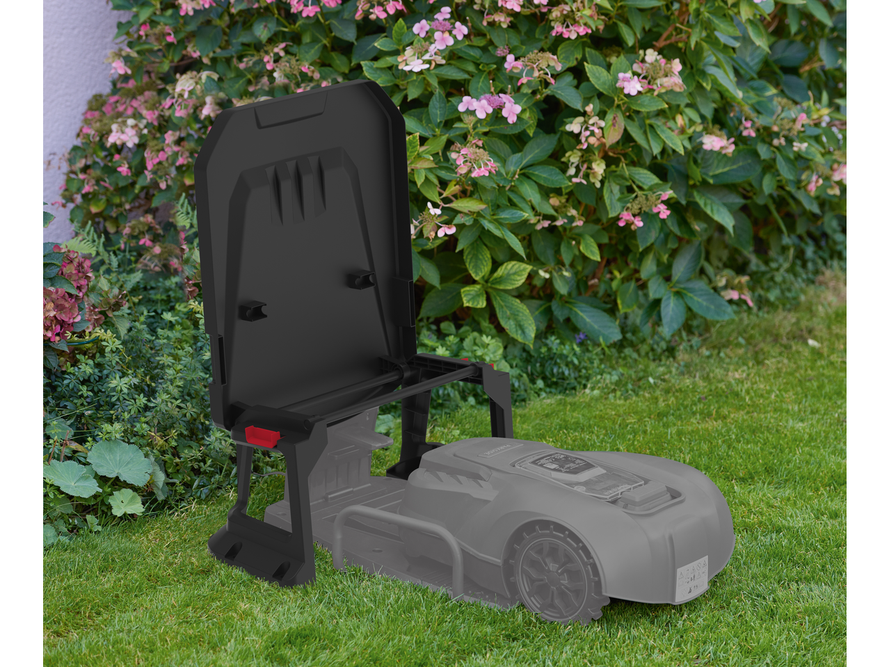 PARKSIDE garage for robotic lawnmower with the lid open, with a gray robotic lawnmower underneath