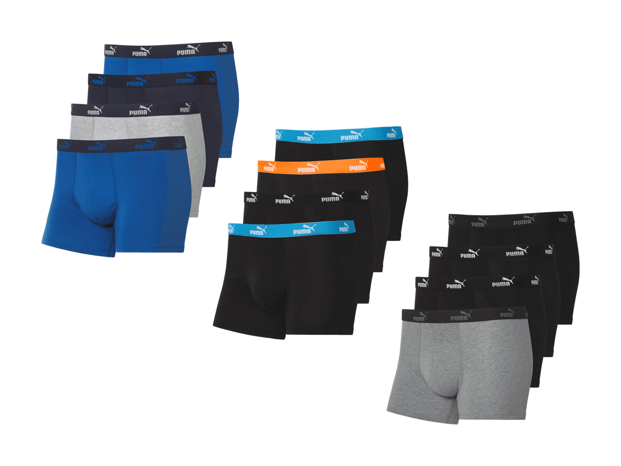 Mehrere Stapel von Boxershorts in verschiedenen Farben: Blau, Grau, Schwarz mit farbigen Bündchen.