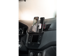 ULTIMATE SPEED® Smartphone Holder in a car, mounted on the dashboard with two phones.