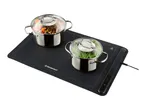 Two pots with food on a black warming plate with temperature controls.