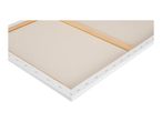 Back of a blank stretched canvas with wooden stretcher bars visible.