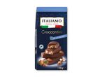 Pakke med chokoladebarer med nødder, mærket 'Croccantini' og '50% mælkechokolade'.