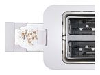 Toaster with crumb tray pulled out, showing breadcrumbs inside.