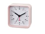 A pink square alarm clock.