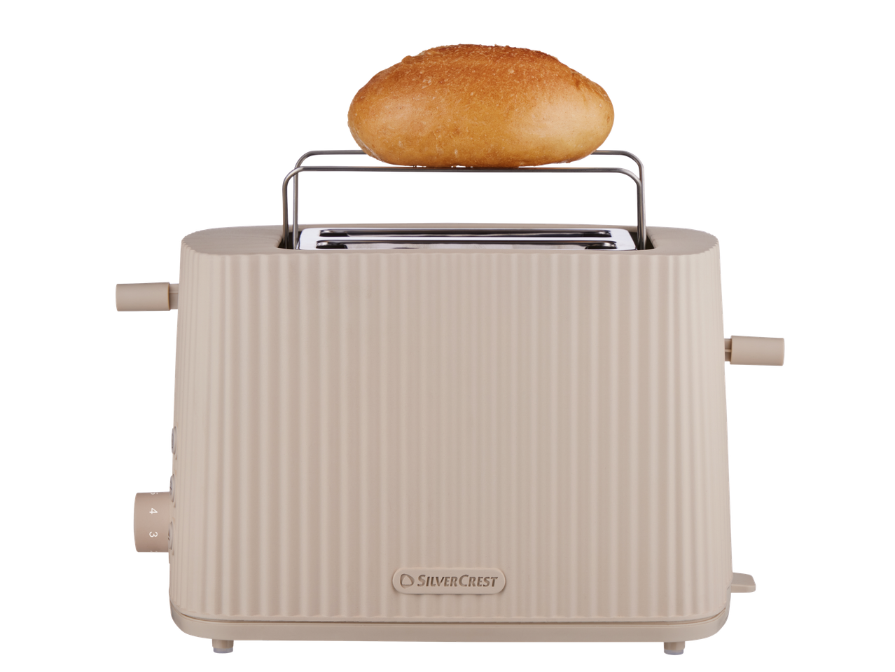 Бежов тостер с кифла върху решетката за притопляне.