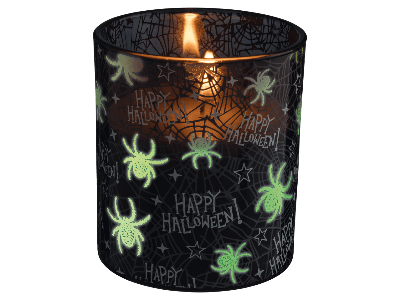 Világító, pókmintás halloweeni gyertya sötét háttér előtt.
