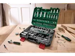 Parkside® tool set with wrenches and ratchet bits on a wooden table.