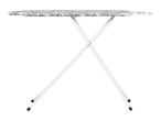 White ironing board with a patterned grey and white cover