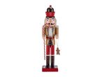 Nutcracker figurine with a candy cane and gingerbread man ornament