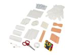 First aid kit contents including bandages, gauze, medical tape, scissors, safety pins, and gloves.