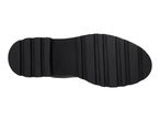 Bottom view of a black lug sole boot.