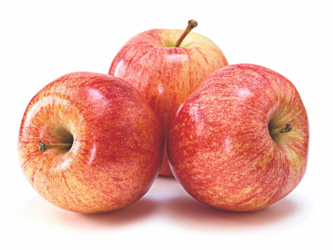 Três maçãs vermelhas e amarelas com riscas, dispostas em grupo.