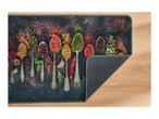 A kitchen mat with a spice-themed design, featuring spoons filled with various spices.