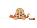 A wooden fox pull-along toy with a shape sorter drum and three matching blocks.