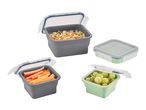 Collapsible food storage containers with pasta salad, carrots, and grapes.