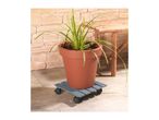 Potted plant on a grey wooden plant caddy with wheels, next to a bamboo bench.