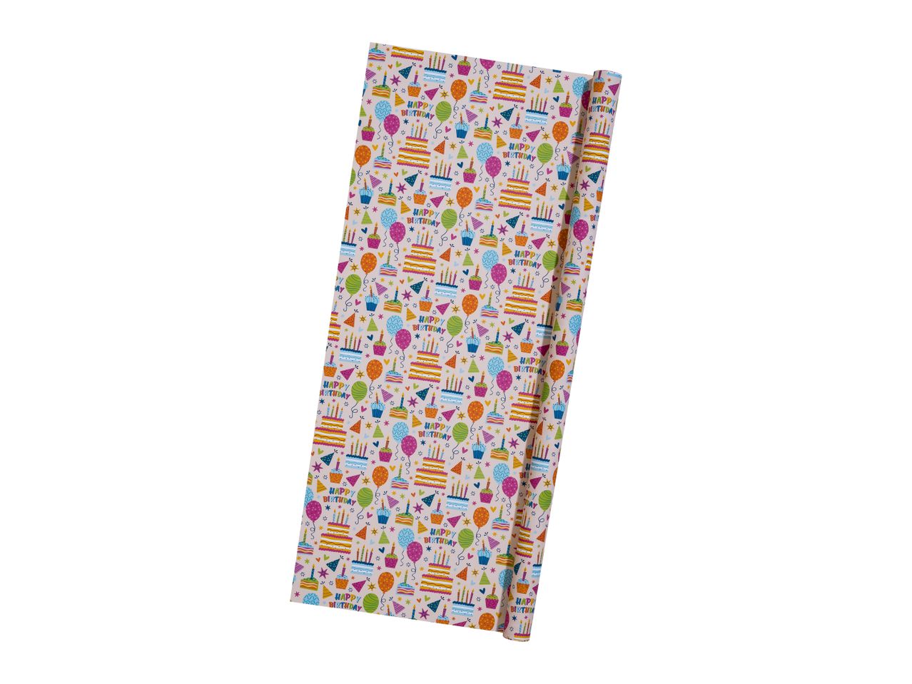 A roll of birthday wrapping paper with cakes, balloons, and 'Happy Birthday' text.