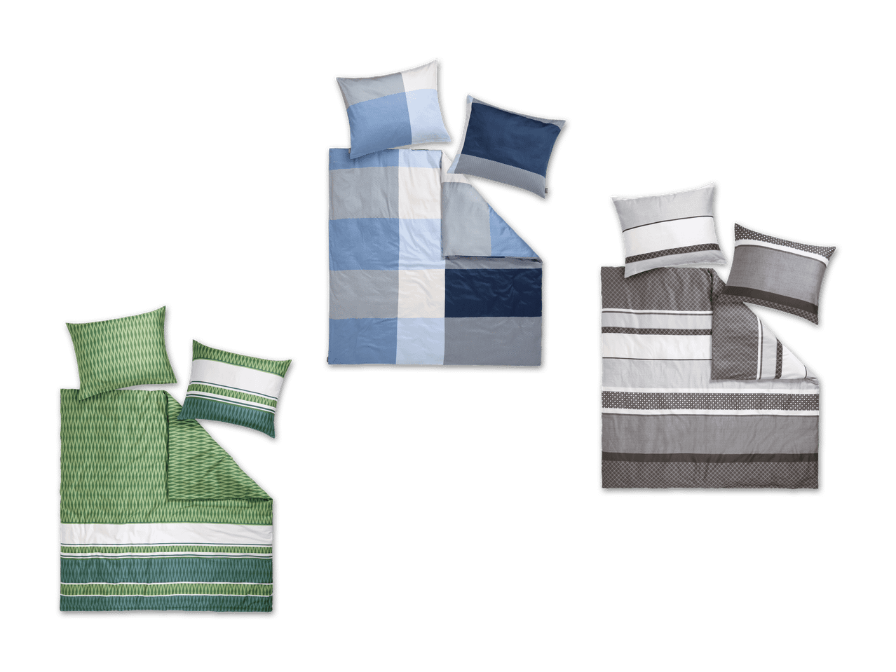 Drei Bettwäsche-Sets in Grün, Blau und Grau mit verschiedenen Mustern.