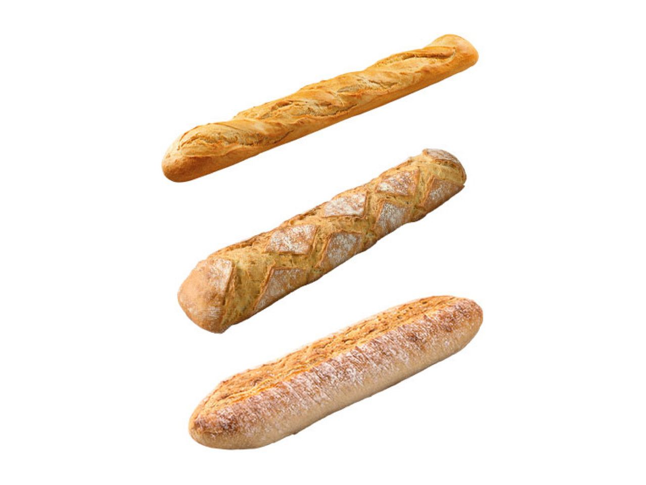 Three different types of baguettes, including a classic baguette, a rustic baguette, and a seeded baguette.