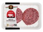 Wagyu marhahús hamburgerek csomagolásban, „Grass Fed” felirattal.