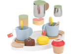 Un set da tè giocattolo con tazze, teiera, zucchero e dolcetti su un vassoio.